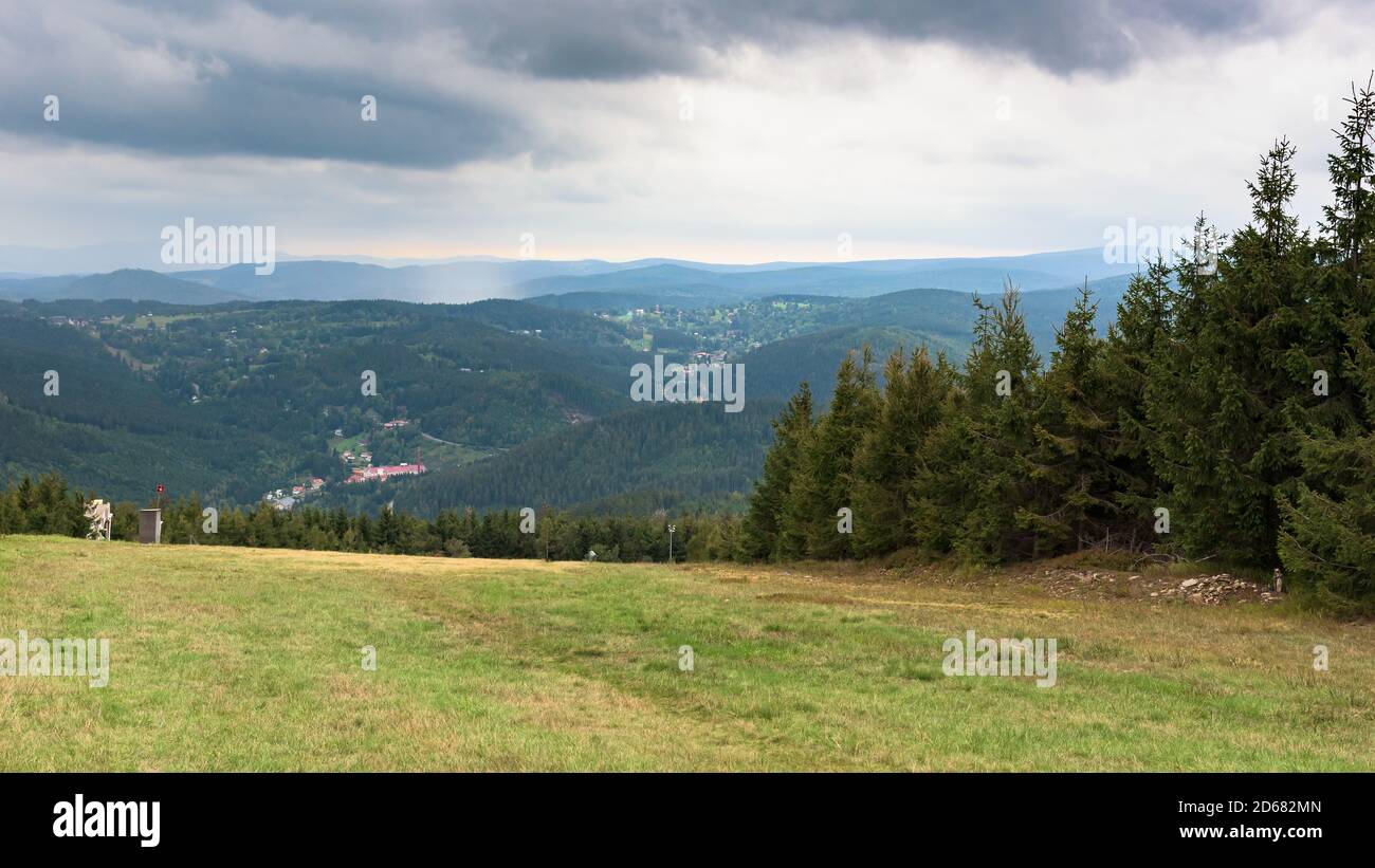 Summer panoramic view of Czech Karkonosze mountains from ski slope of Certova mountan in Harrachov Stock Photo