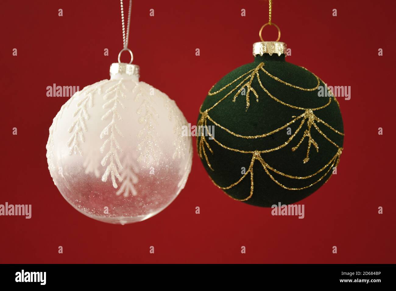Christmas Baubles on a red background Stock Photo