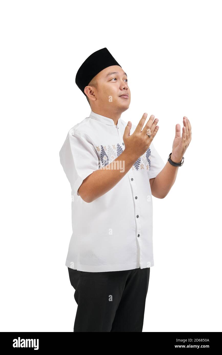 Asian muslim man hands praying with white background Stock Photo