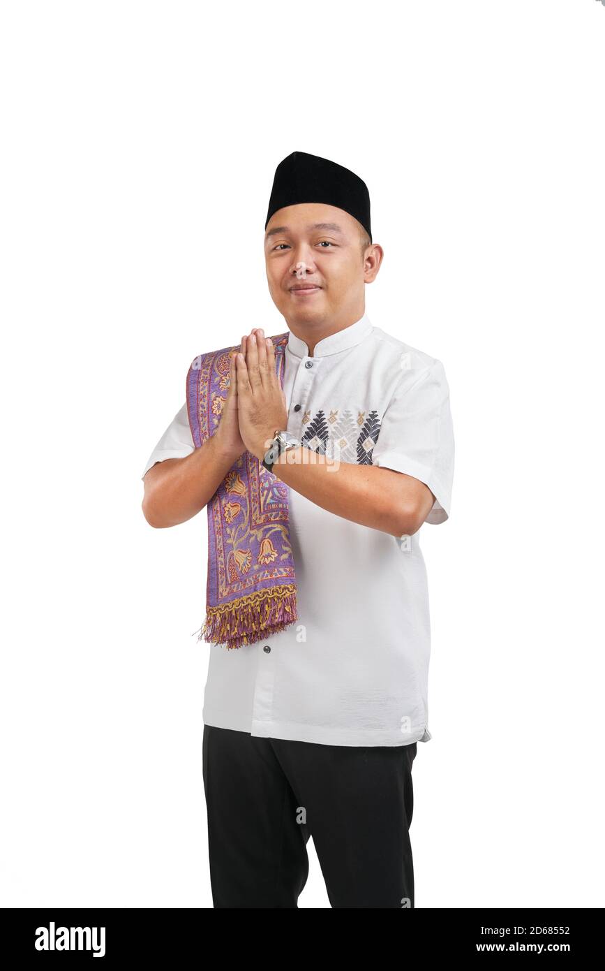 Asian muslim man hands greetings with white background Stock Photo