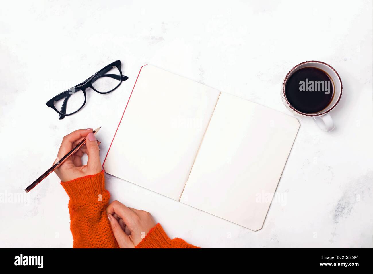 Woman in red sweater glasses hi-res stock photography and images - Alamy