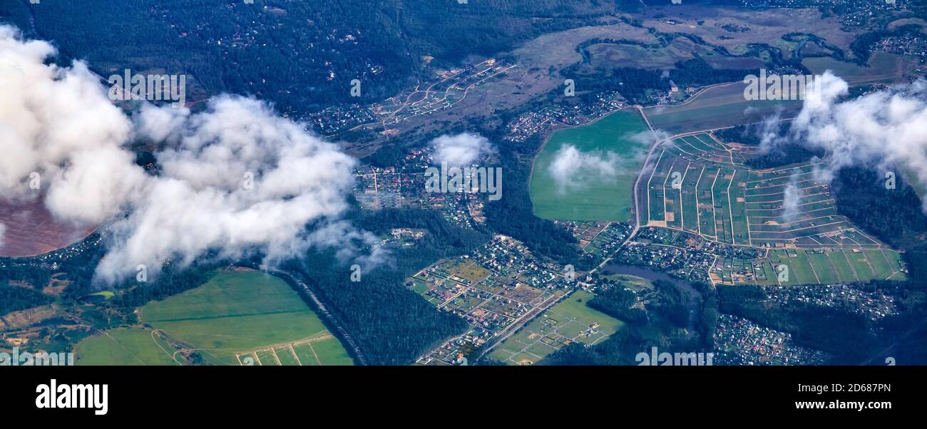 aerial view of a densely populated region with with villages and fields Stock Photo