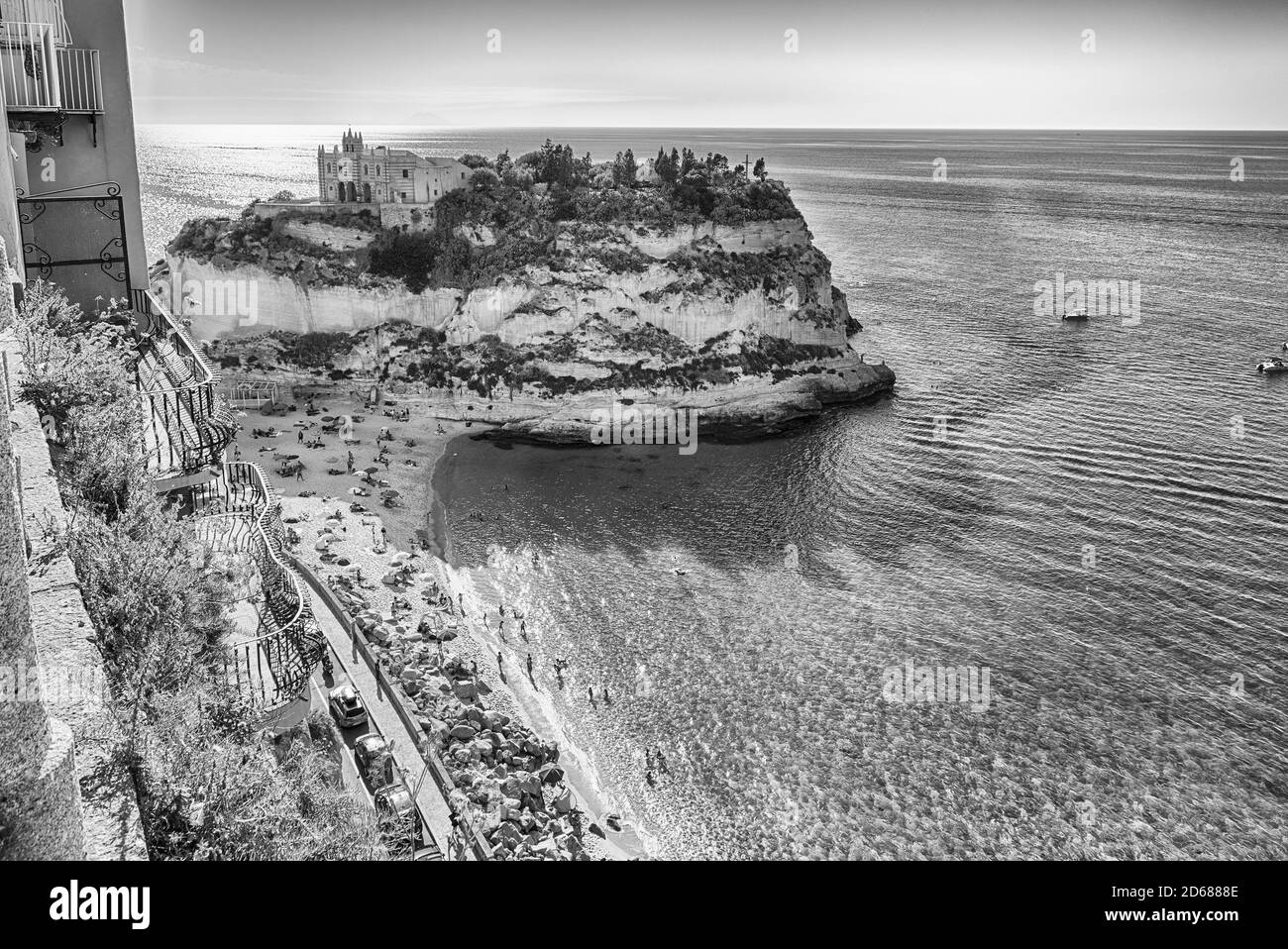 View over Isola Bella Beach, iconic seaside place in Tropea, a seaside resort located on the Gulf of Saint Euphemia, part of the Tyrrhenian Sea, Calab Stock Photo