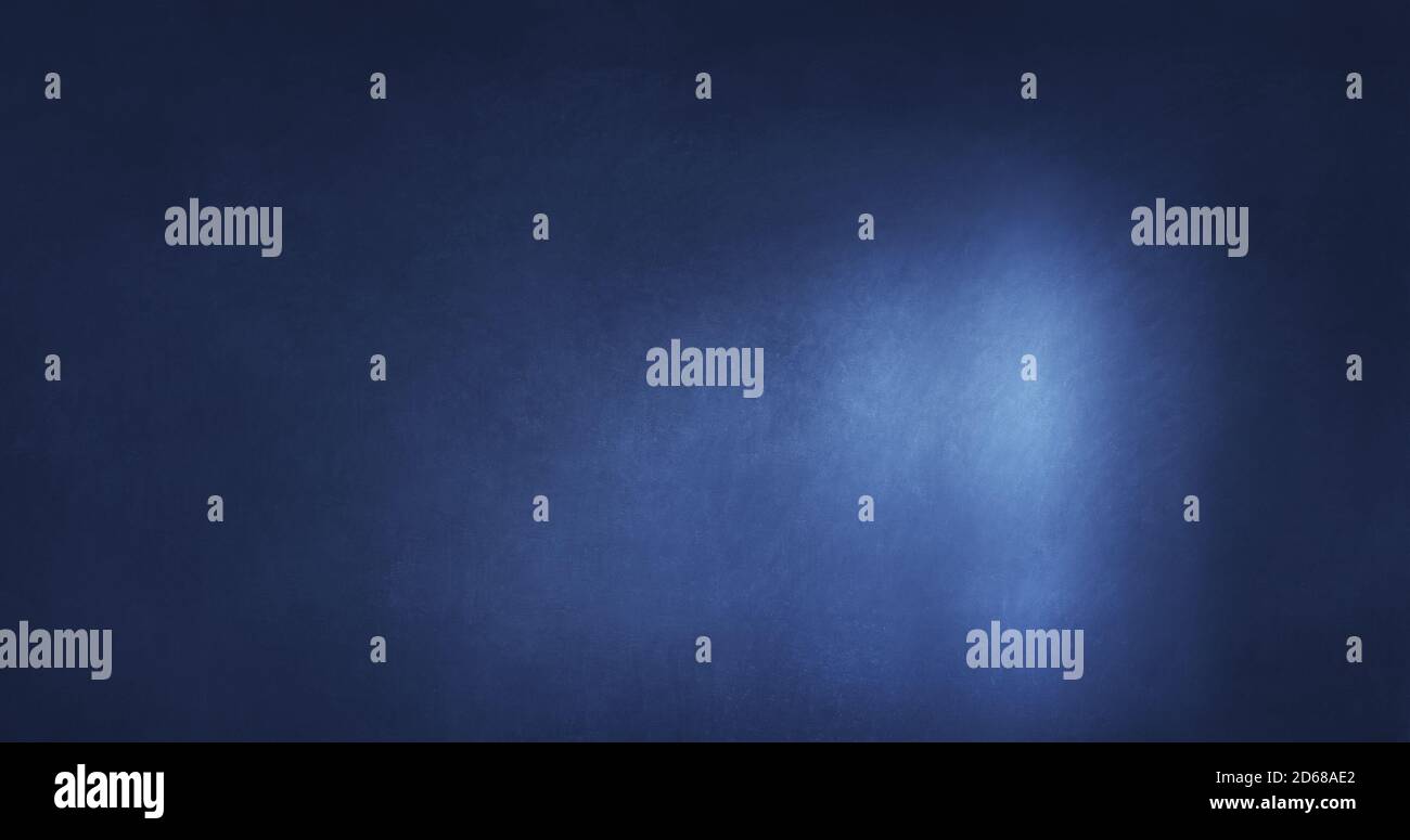 Empty room with a blue wall Stock Photo - Alamy
