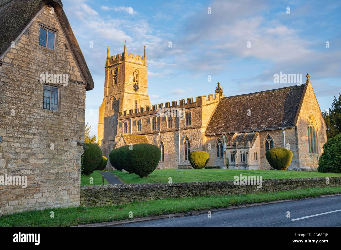 St Peter and St Paul Church in autumn just after sunrise. Long Compton ...