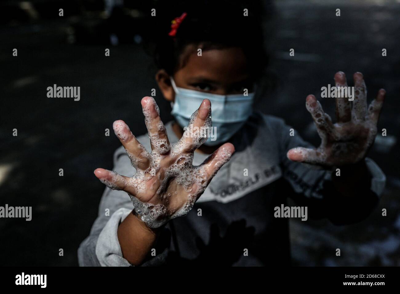 Bogor, Indonesia. 15th Oct, 2020. Indonesian children washes his hands together during the World Handwashing Day 2020 in Bogor, West Java, Indonesia, on October 15, 2020. Thorough hand washing is an effective protection against many infectious diseases amid the COVID19 pandemic. (Photo by Aditya Saputra/INA Photo Agency/Sipa USA) Credit: Sipa USA/Alamy Live News Stock Photo