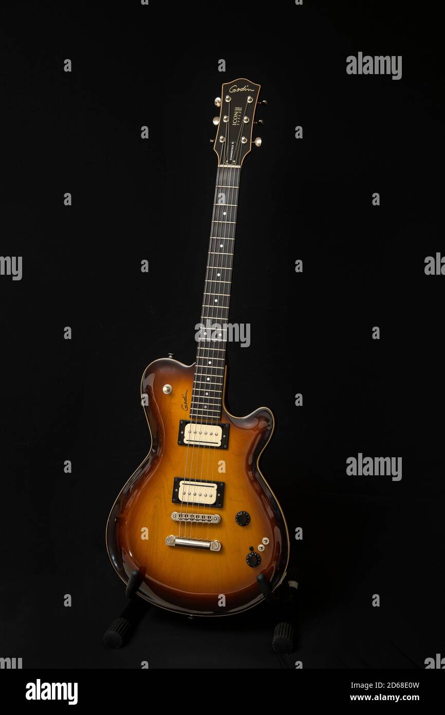 Godin Icon 2 convertible Canadian made electric guitar. Seymour Duncan P  Rail pickups, ebony neck Stock Photo - Alamy