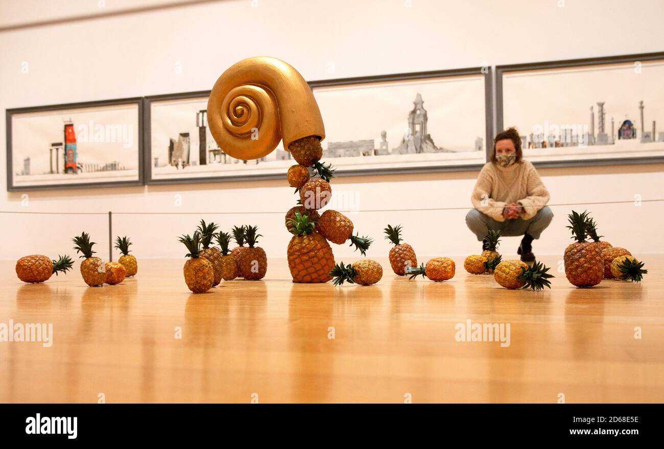 London, UK. 15th Oct, 2020. 'From the Birth of Paradise' by Edward Allington 1951-2017. Plastic pineappled tumble from a gold shell that seems to float in mid air. Tate Britain opens New Collection routes Credit: Mark Thomas/Alamy Live News Stock Photo