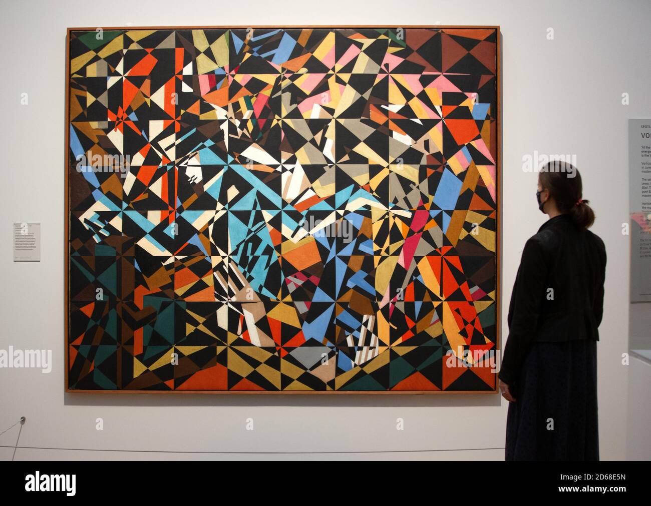 London, UK. 15th Oct, 2020. 'In the Hold' by David Bomberg 189-1957. The subject is the hold of a ship where the dock workers are handling heavy freight. Tate Britain opens New Collection routes Credit: Mark Thomas/Alamy Live News Stock Photo