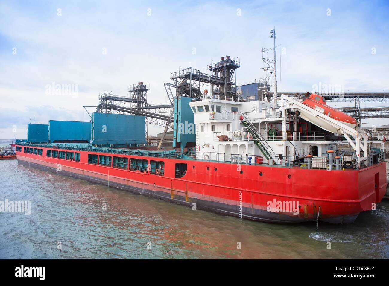 download holds of cargo ship bulk cargo on jetty Stock Photo Alamy
