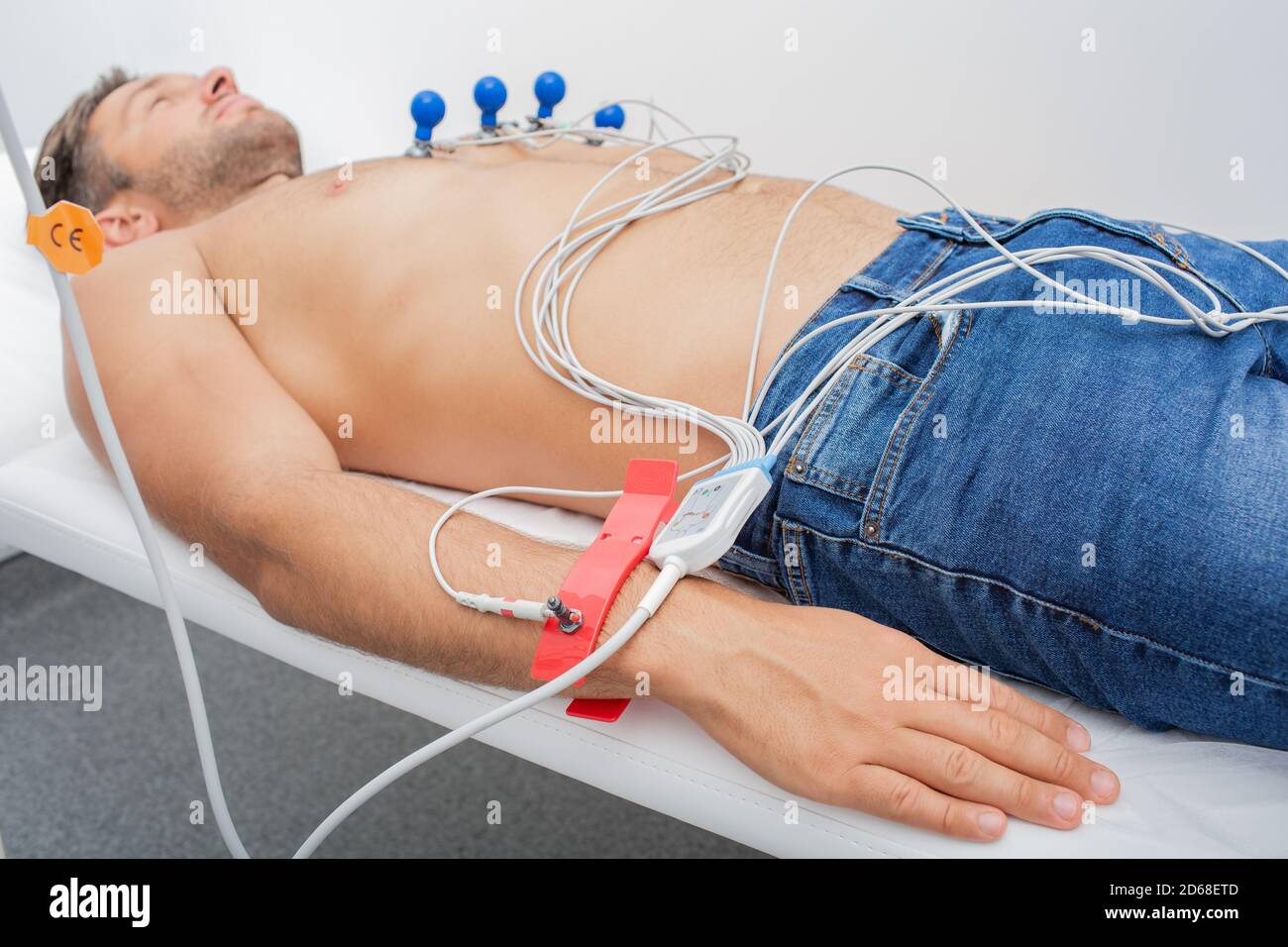 ECG electrodes on male wrist for measurement pulse trace. Process of