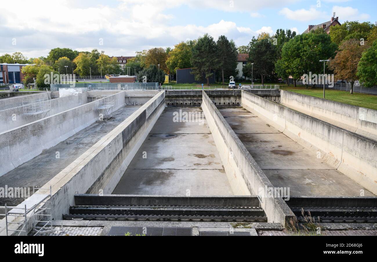 Kassel, Germany. 12th Oct, 2020. The waste water in the sedimentation basins has been drained due to renovation. 'Kasselwasser' is a company owned by the city of Kassel with about 170 employees. The sewer network has a total length of 840 km. The wastewater is treated in a central sewage treatment plant. Credit: Andreas Arnold/dpa/Alamy Live News Stock Photo