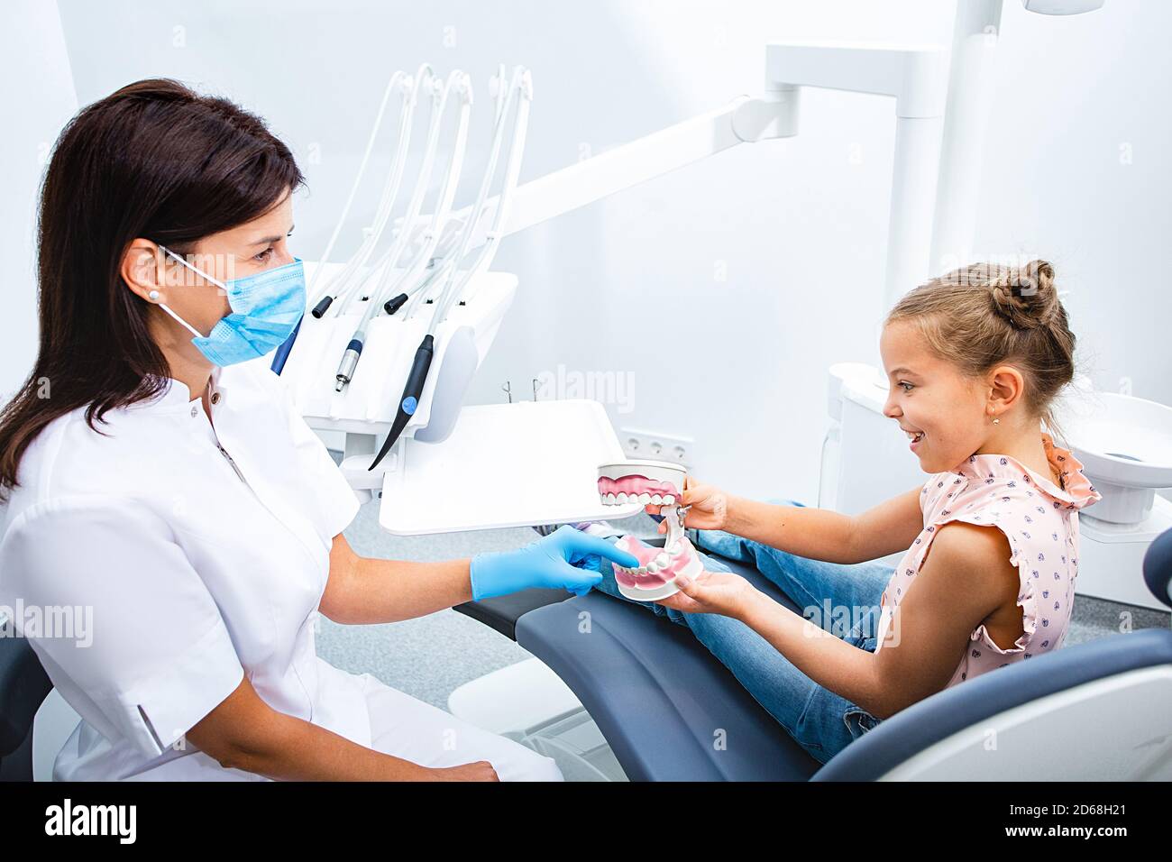 Happy dentist and child communicate, Teeth treatment child. Child's