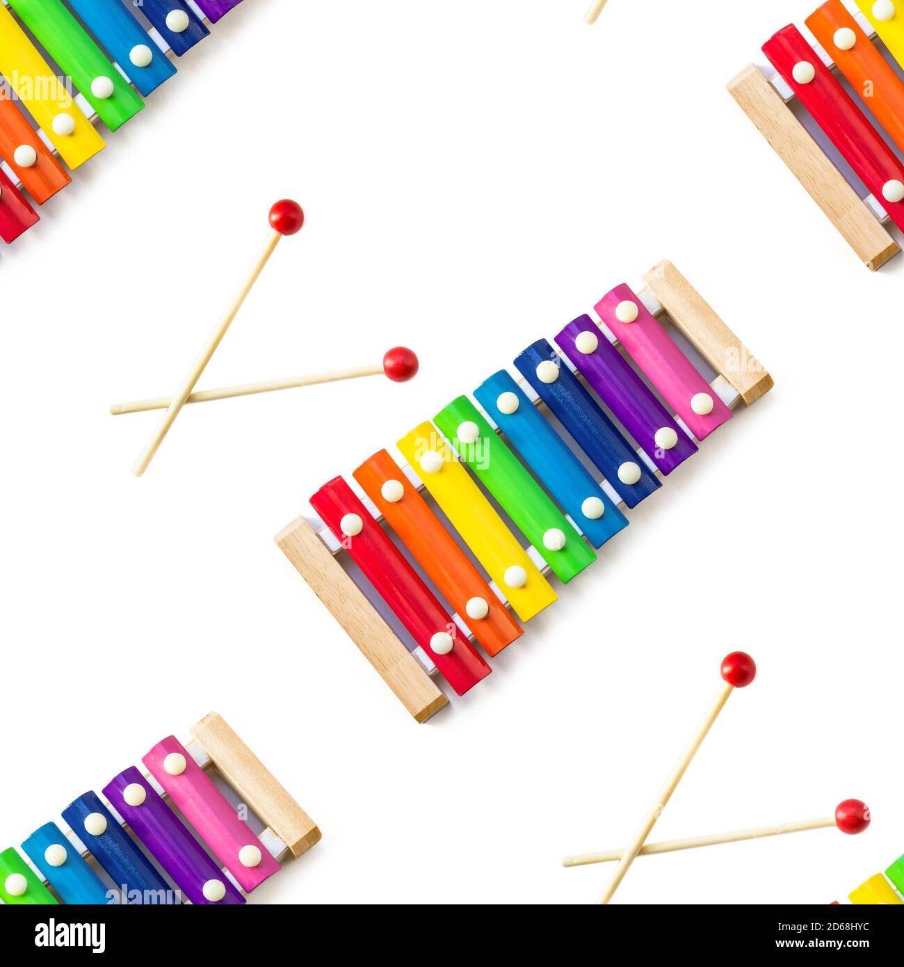 Seamless pattern of Rainbow Colored Wooden Toy 8 tone Xylophone glockenspiel isolated on white background with clipping path. toy glockenspiel made of Stock Photo