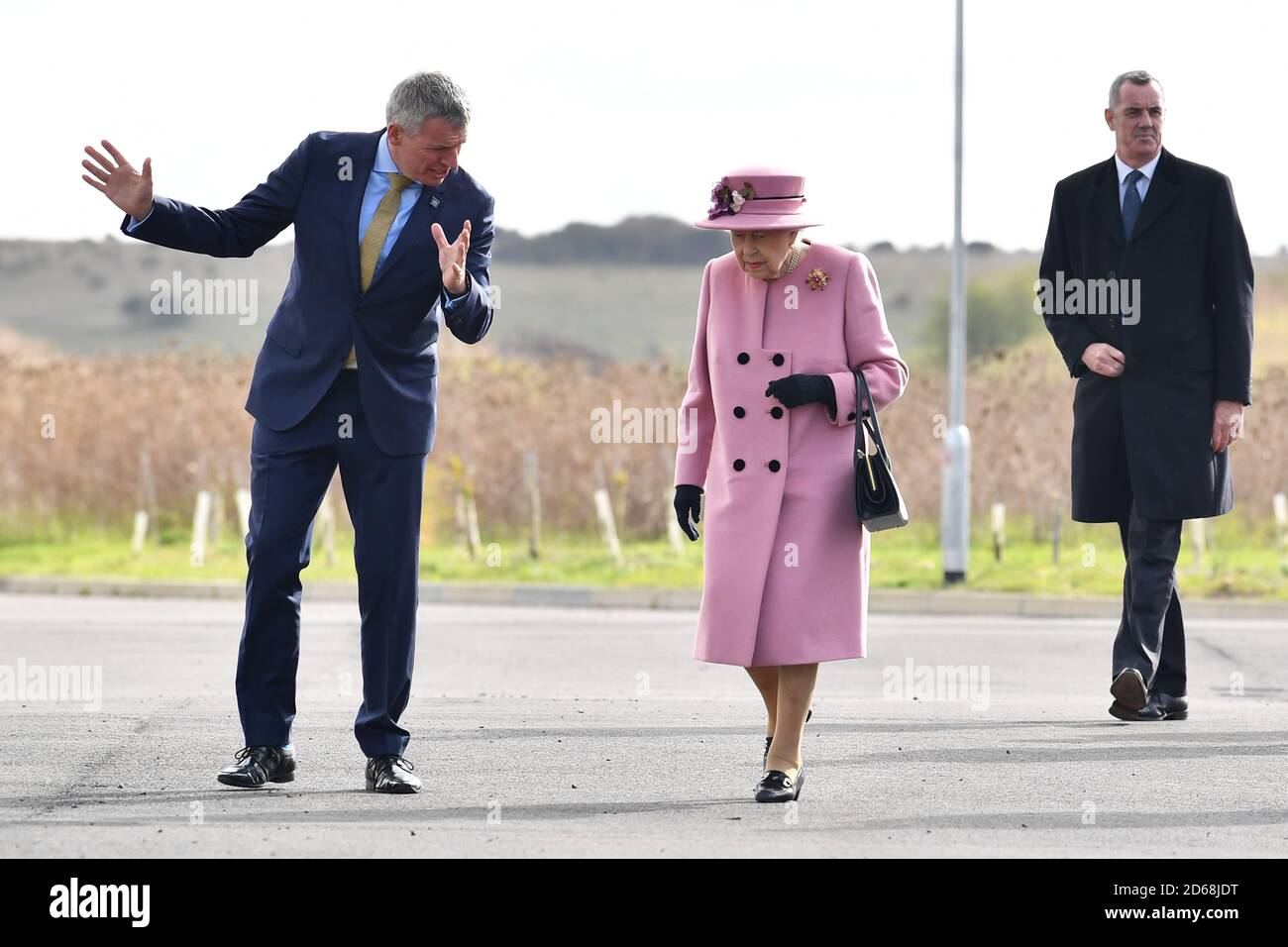 Queen Elizabeth II is greeted by Chief Executive Gary Aitkenhead as she arrives for a visit to the Defence Science and Technology Laboratory (DSTL) at Porton Down, Wiltshire, to view the Energetics Enclosure and display of weaponry and tactics used in counter intelligence, and meet staff who were involved in the Salisbury Novichok incident. Stock Photo