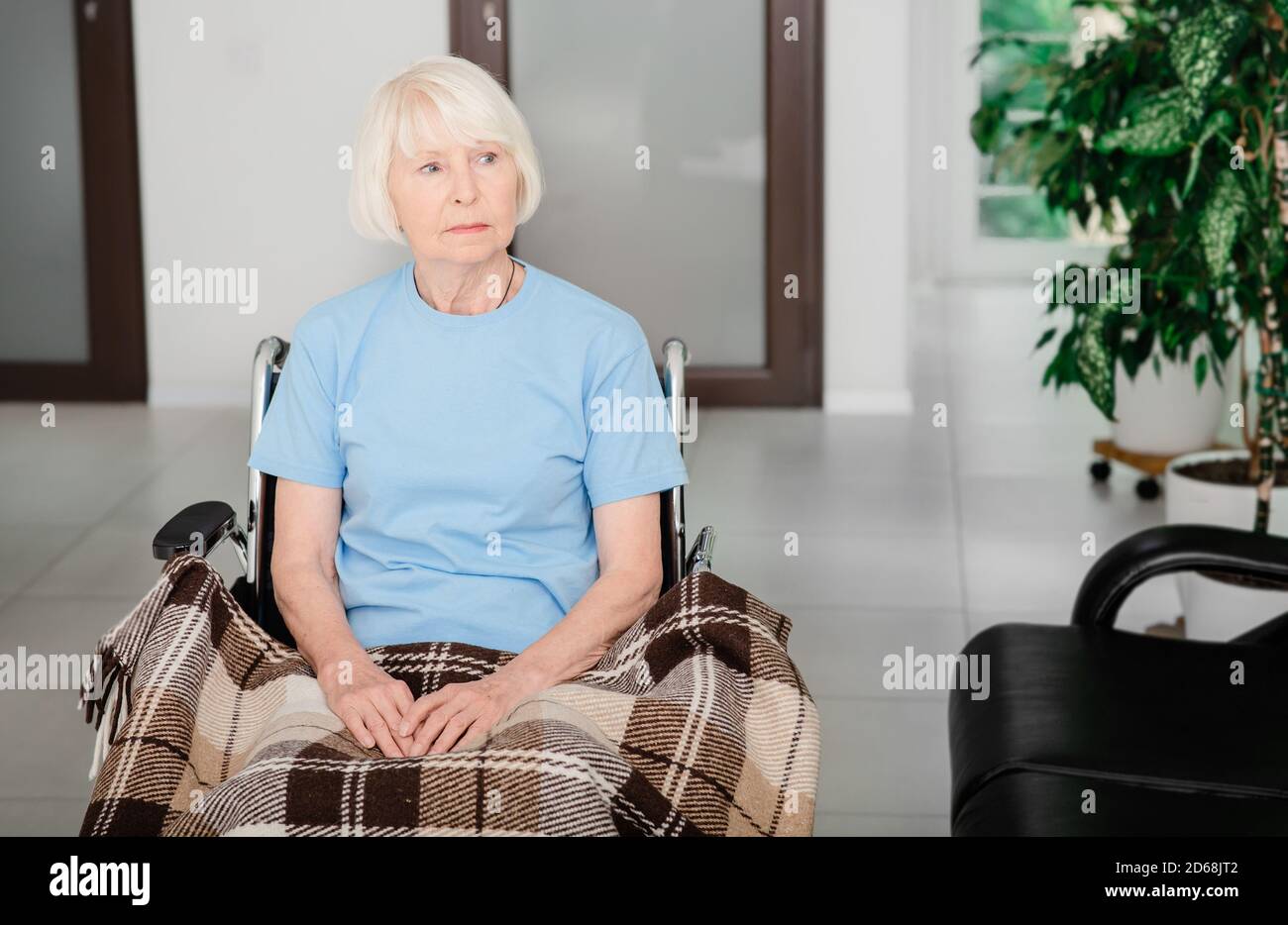 Sad old woman in wheelchair hi-res stock photography and images - Alamy