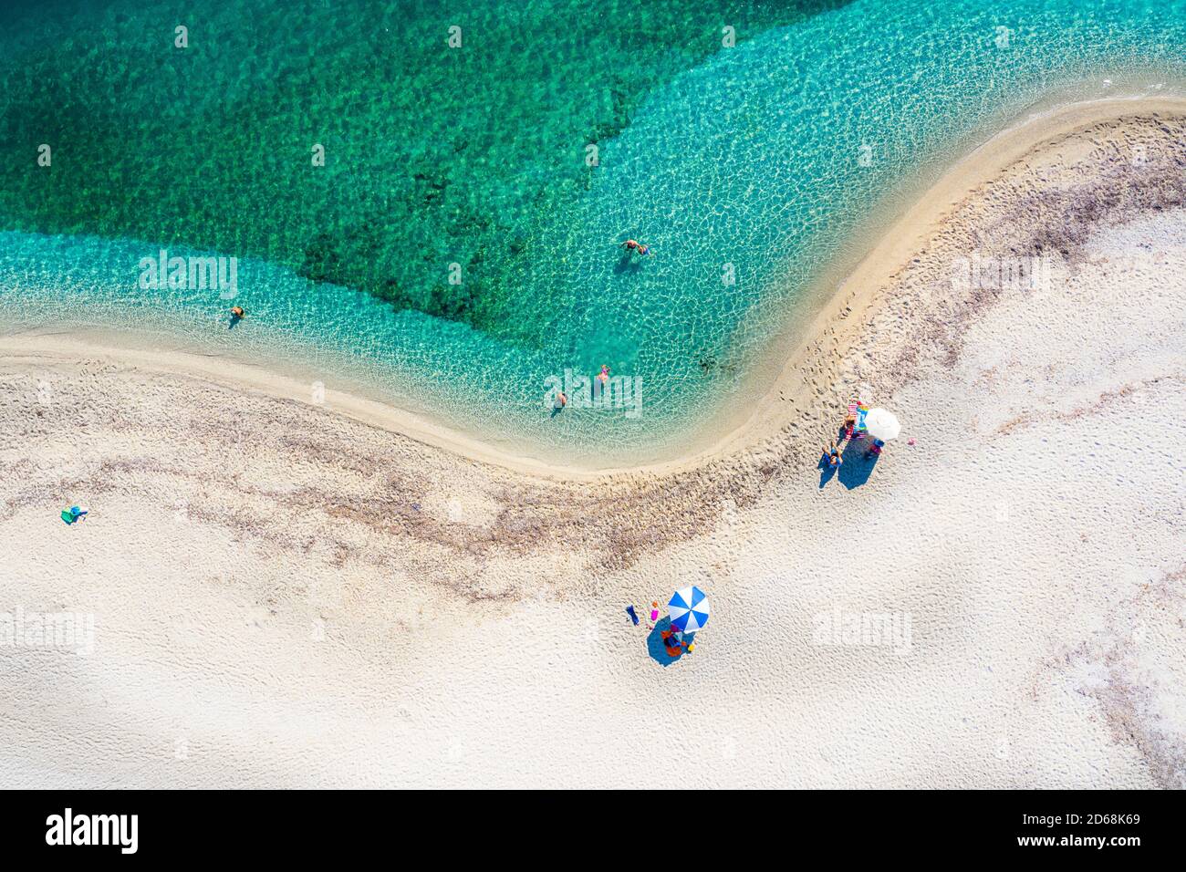 Aerial shot of a secluded and spectacular beach with turquoise waters in Lefkada, Greece. Stock Photo