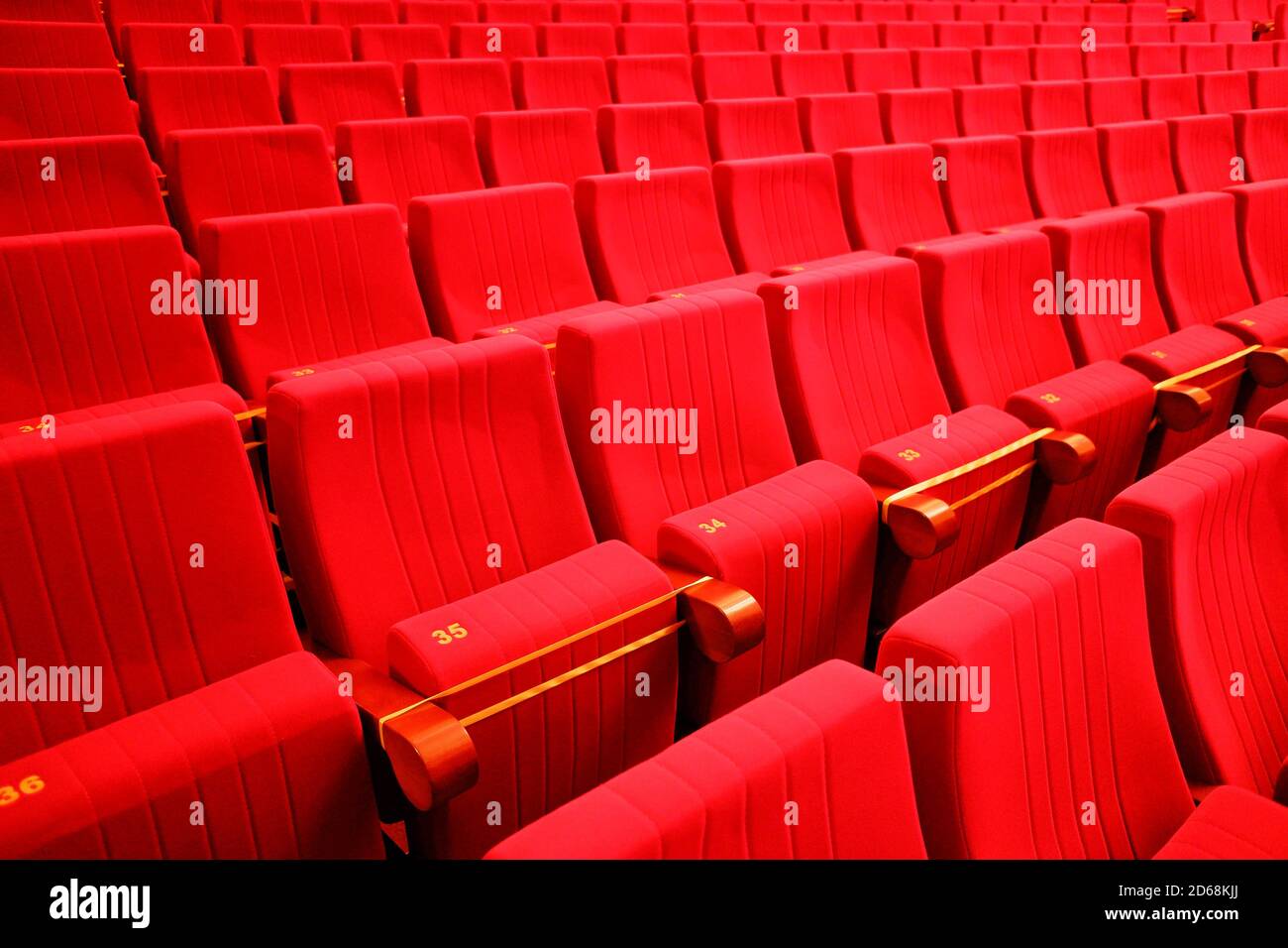 seats in the theater. Social distance between spectators in the hall Stock Photo