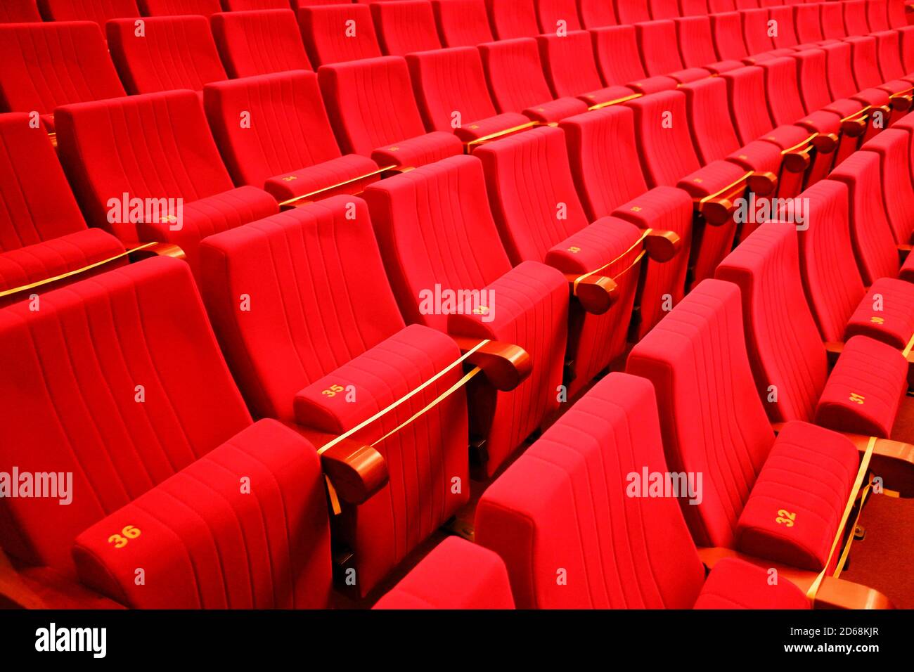 seats in the theater. Social distance between spectators in the hall Stock Photo