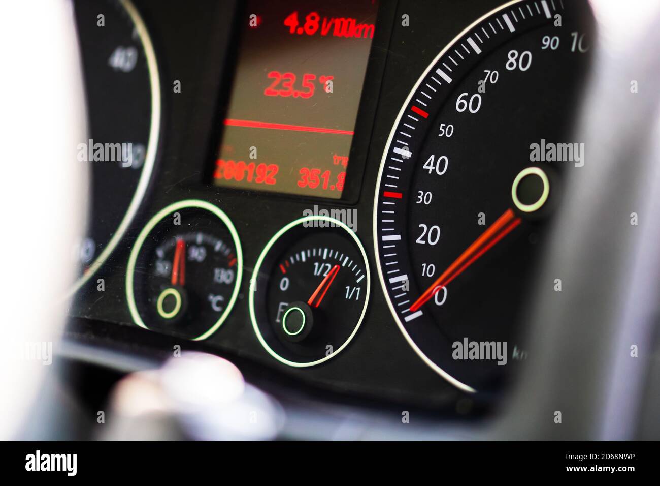 Selective focus on digital display of car isolated. Car speedometer