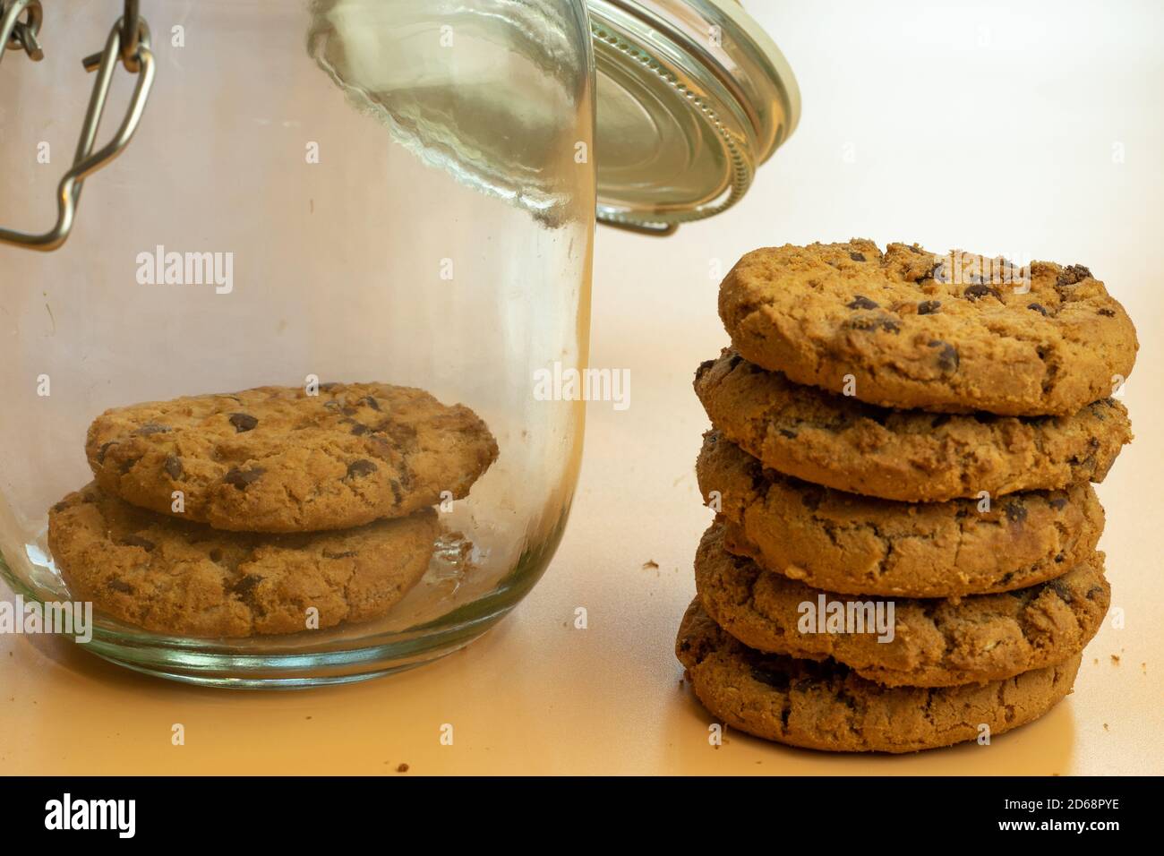 Oatmeal oat cookies in glass jar. Vegan food diet concept Stock Photo