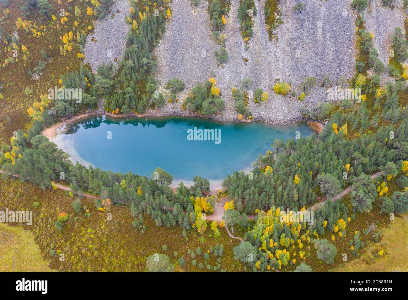 Autumn aerial view of An Lochan Uaine  (Green Loch) due to the striking green colour of it's water in Cairngorms National Park, Scotland,UK Stock Photo