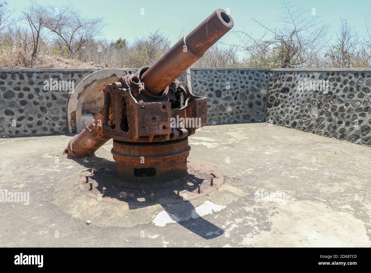 ancient war cannon located in medieval tower. Concept of protection and