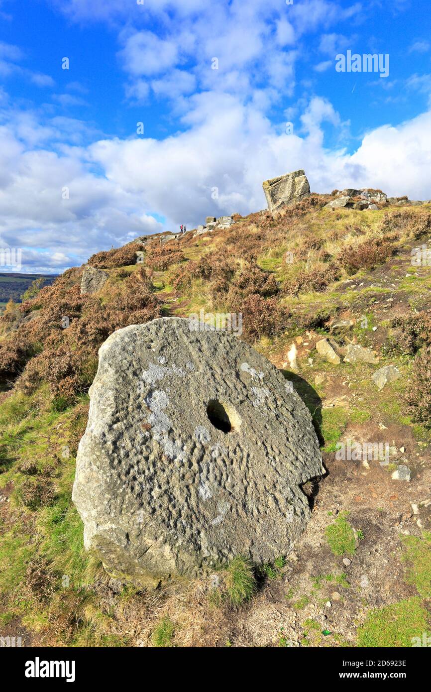 Millstone below Curbar Edge near Calver, Derbyshire, Peak District National Park, England, UK. Stock Photo