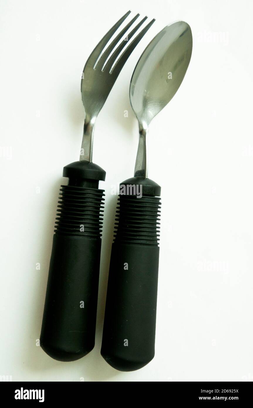 https://c8.alamy.com/comp/2D6925X/spoon-and-fork-cutlery-for-sick-disabled-people-specialized-with-fork-and-spoon-cuterly-for-disabled-peopleblack-silcon-rubber-2D6925X.jpg