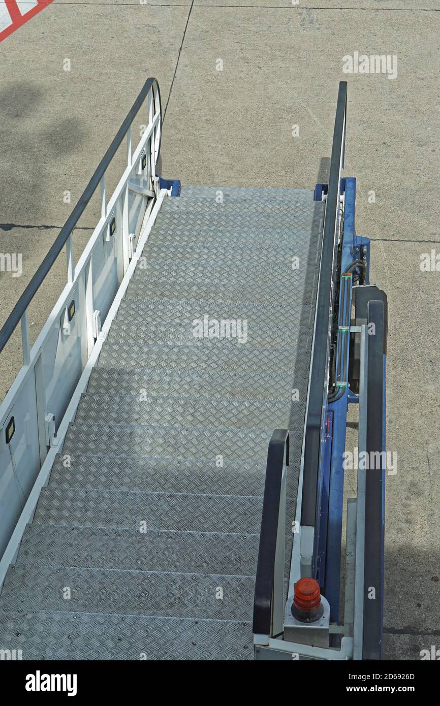 Passenger boarding stairs vehicle at airport Stock Photo Alamy