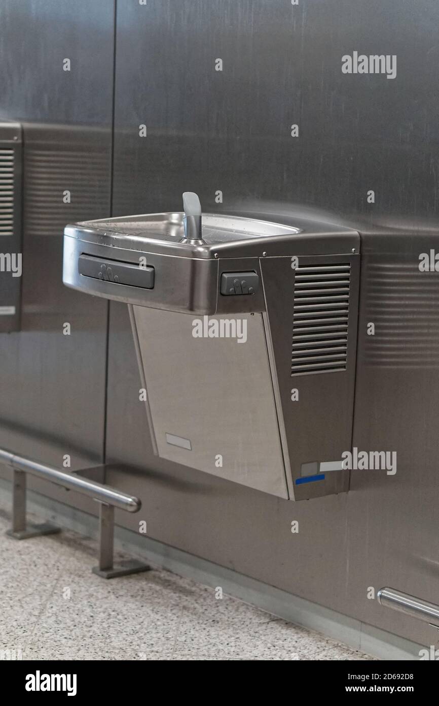 Wall mounted stainless steel drinking fountain Stock Photo Alamy