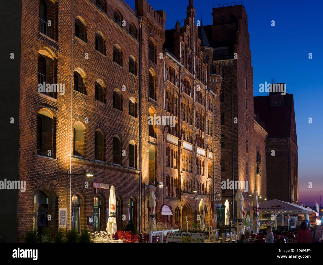 Old warehouses in traditional brick stone architecture in the harbour ...