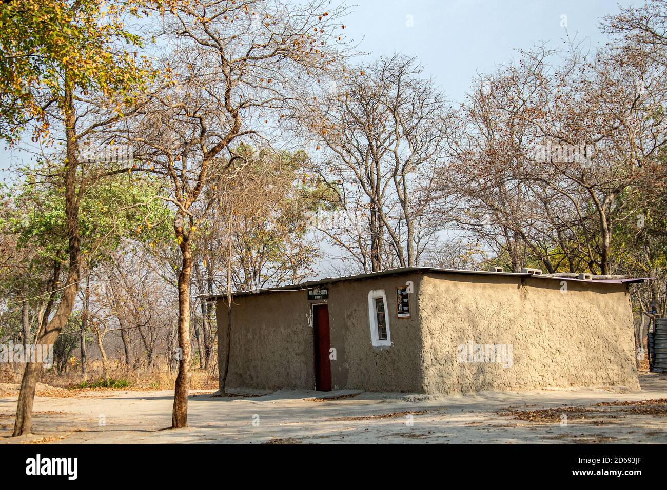 General store made of timber and mud with tin roof in a village in the Kalimbeza (Kalambesa) area near to Katima Mulilo in Namibia. Stock Photo