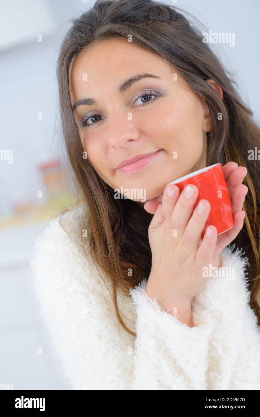 Woman smiling holding tactile hi-res stock photography and images - Alamy