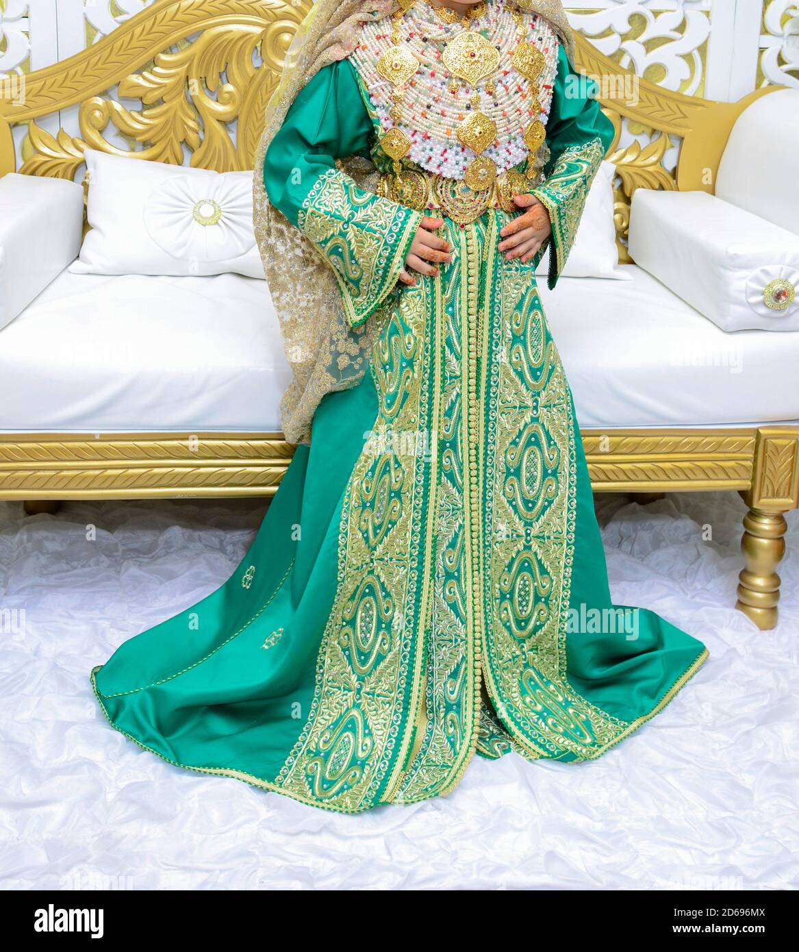 A Moroccan girl from the Moroccan north wears traditional clothes, the Moroccan caftan. The international rise of Berber clothing Stock Photo