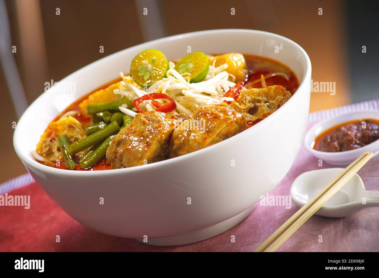 Asian traditional spicy noodle, curry laksa Stock Photo