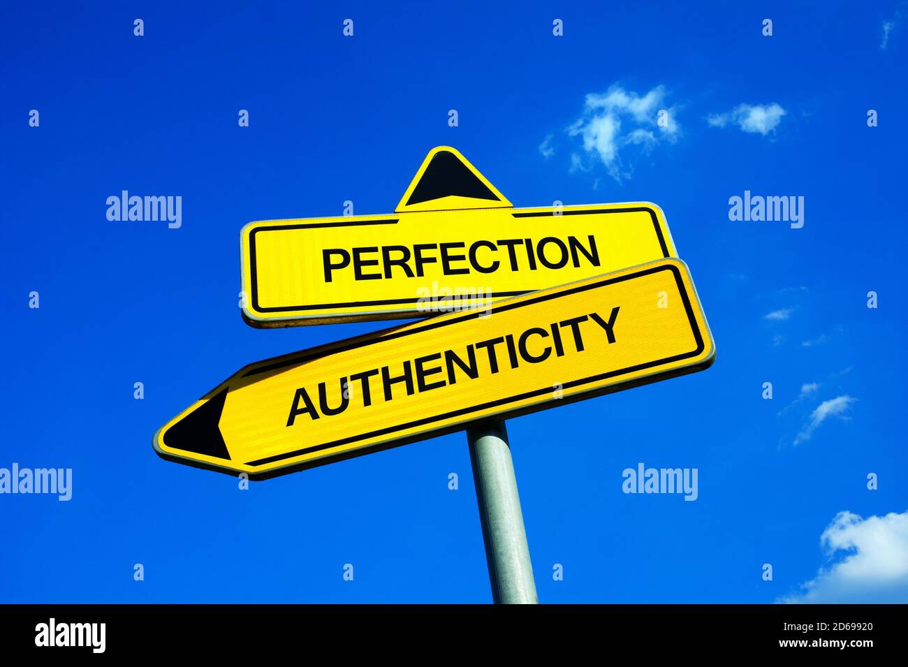Perfection vs Authenticity - Traffic sign with two options - being pefect and flawless or authentic and authentic and imperfect Stock Photo
