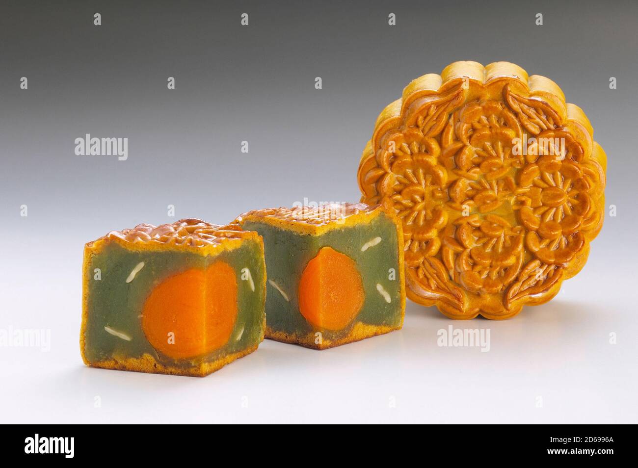 Green tea paste with single yolk mooncake for Chinese Mid Autumn Festival celebration Stock Photo