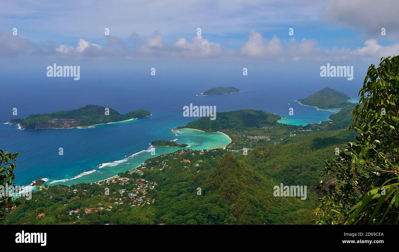 Panorama view from the top of mountain Morne Blanc, Mahe, Seychelles over the northwestern coastline of the island with tropical beach Anse l'Islette. Stock Photo