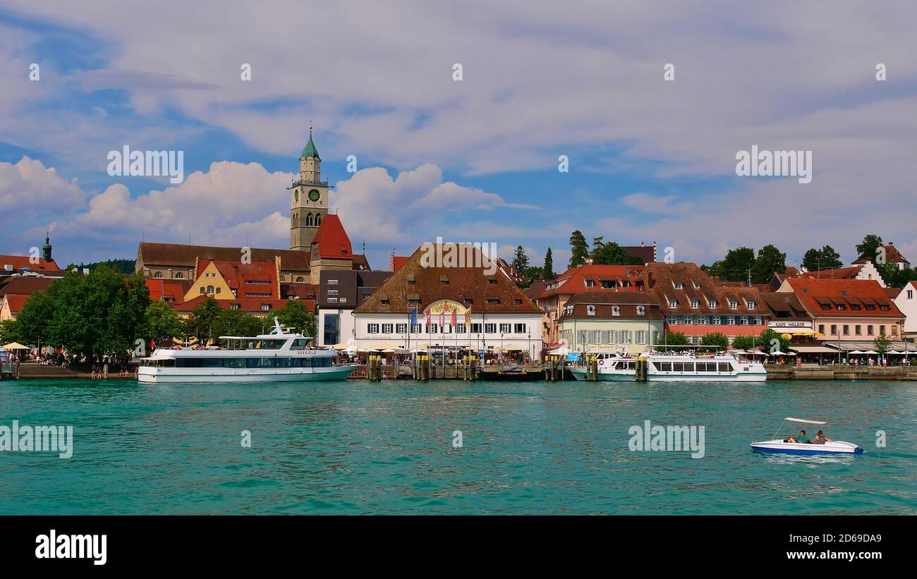 Überlingen, Baden-Wuerttemberg, Germany - 07/14/2018: Front view of the historic center of town Überlingen on the shore of Lake Constance with pier. Stock Photo