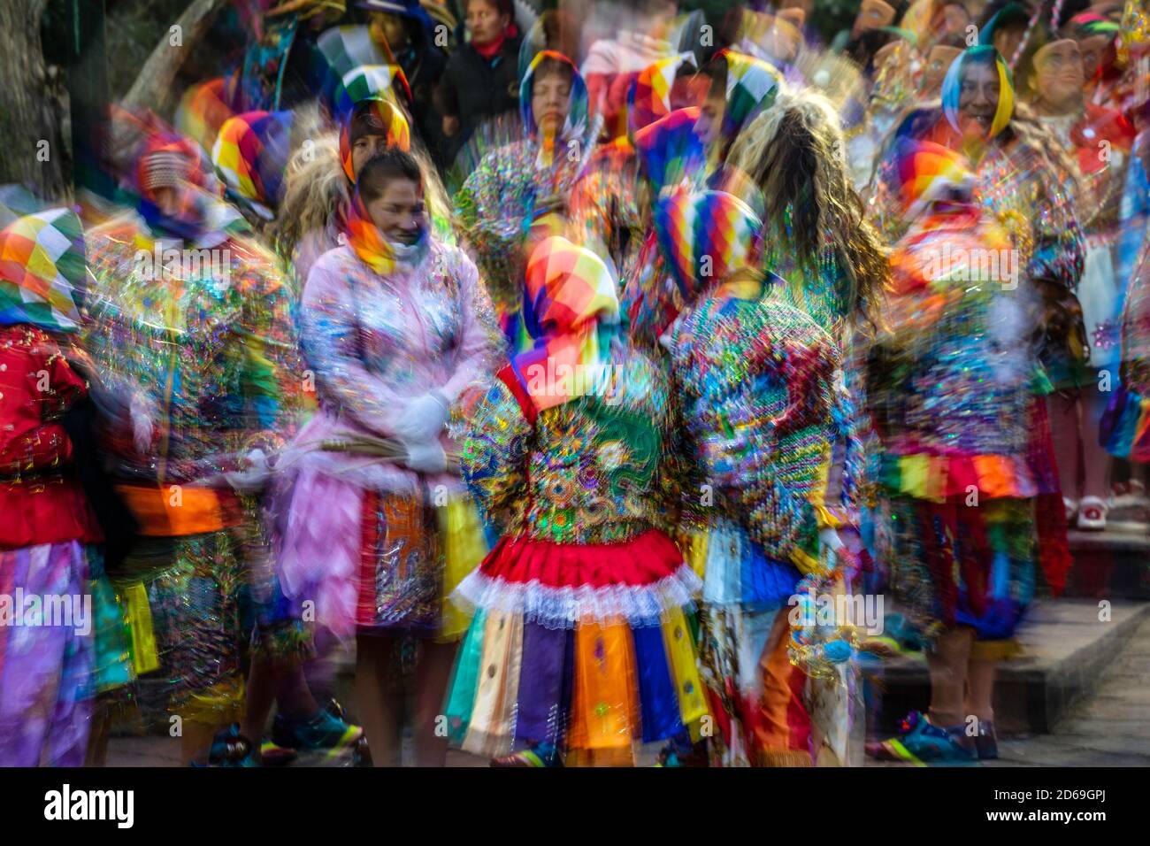 Dancers dressed in colorful costumes (abstract), Fiesta del Senor de Choquekilca (Feast of the Lord of Choquekilca), Ollantaytambo, Cusco, Peru Stock Photo