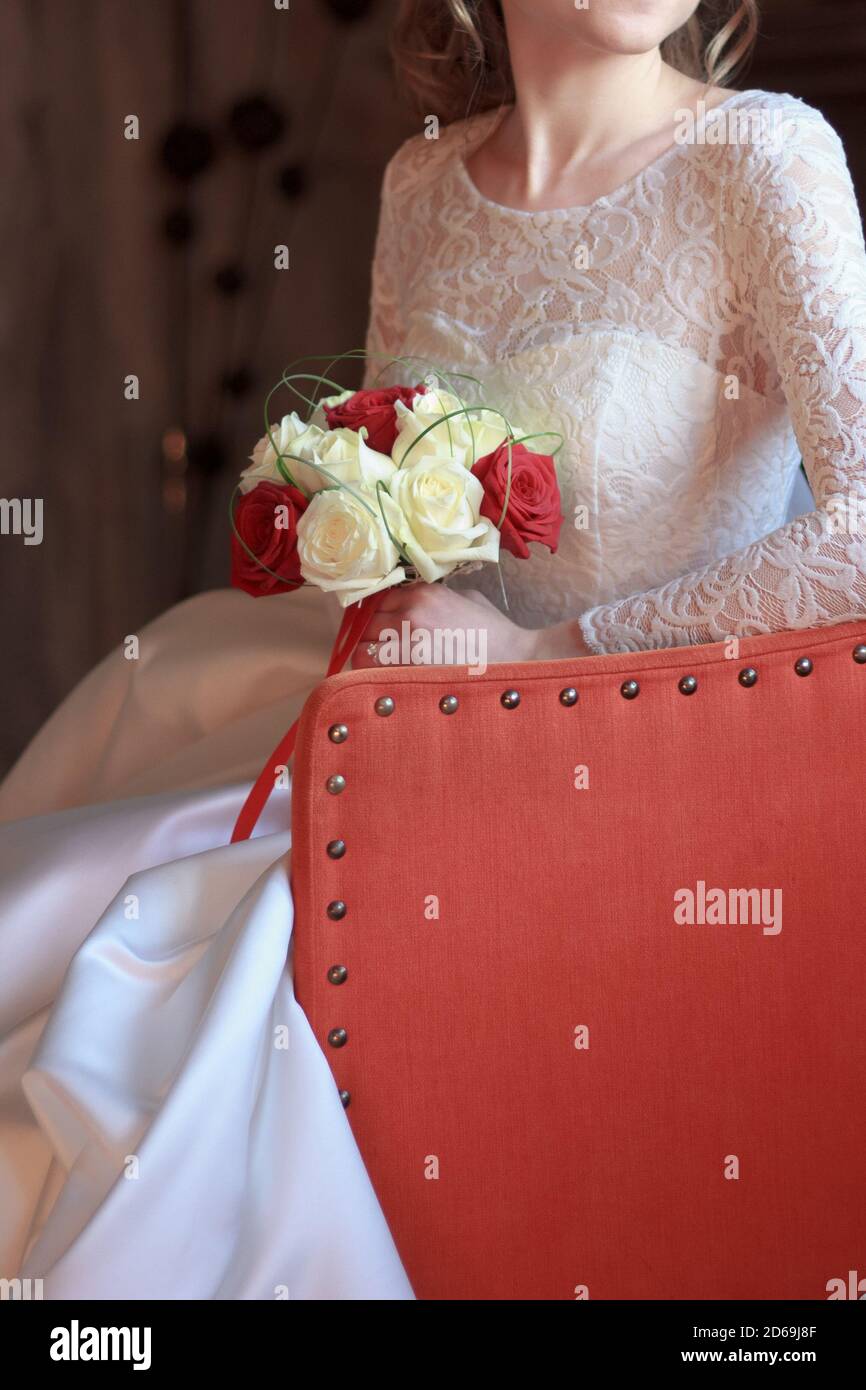 Bride sitting on chair hi-res stock photography and images - Alamy