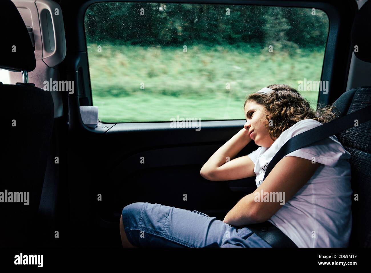 Girl sleeping back seat car hires stock photography and images Alamy