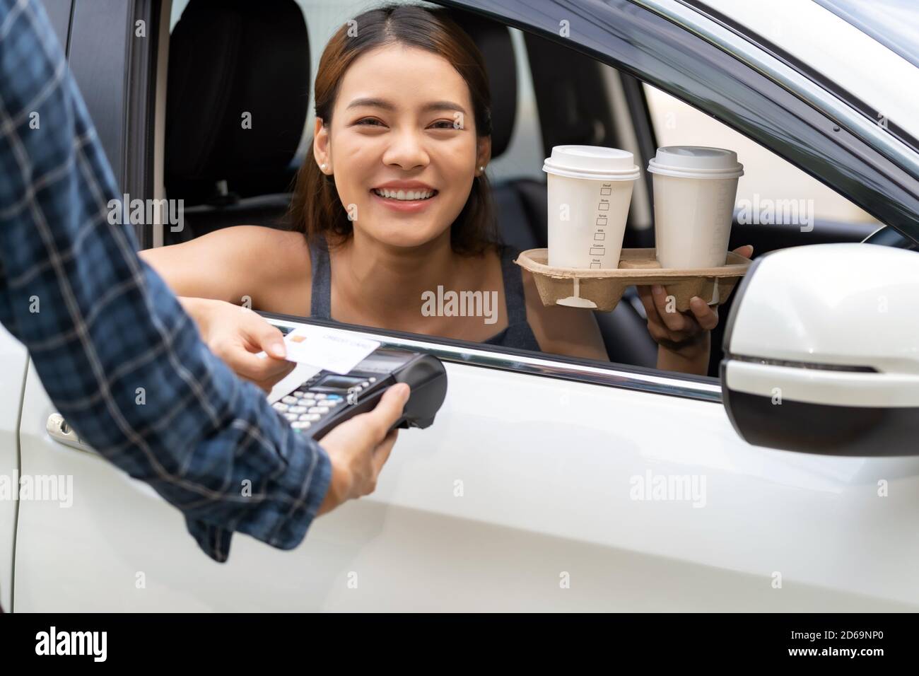 Asian woman customer make mobile payment contactless technology on