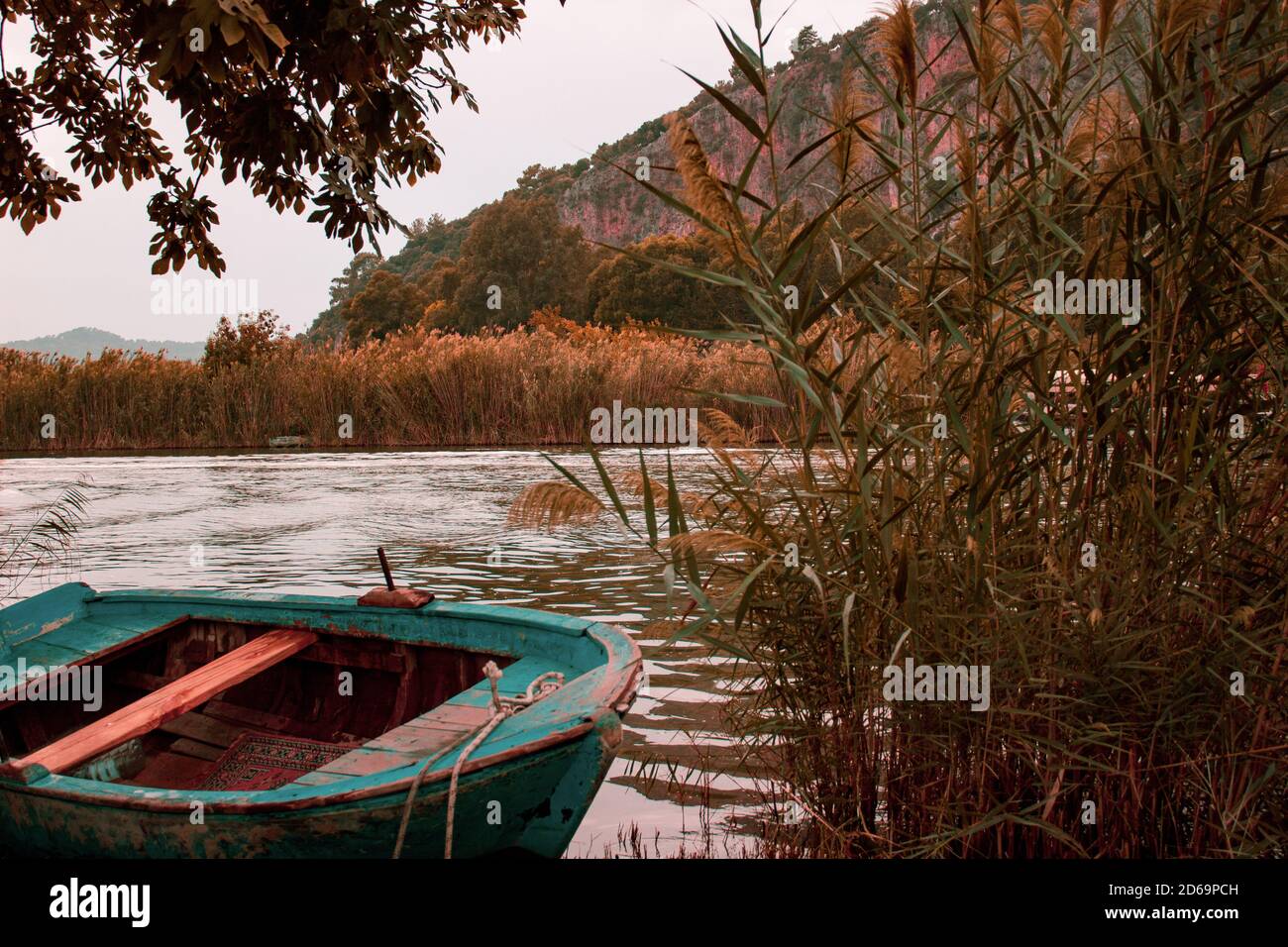 Beautiful view of Dalyan River and the ancient Lycian rock tombs, a must-see destination in Turkey Stock Photo