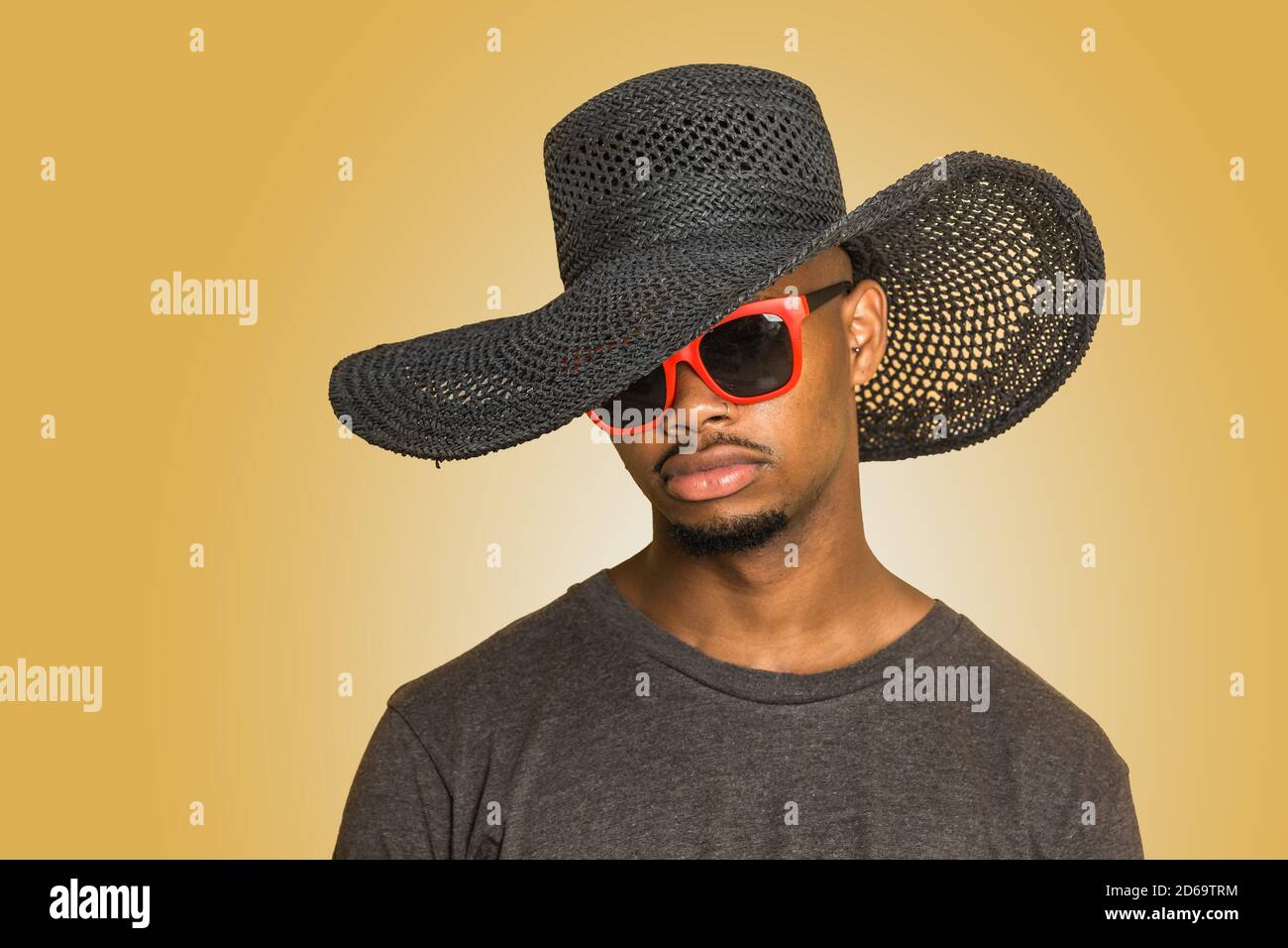 Black hair in yellow background hires stock photography and images Alamy