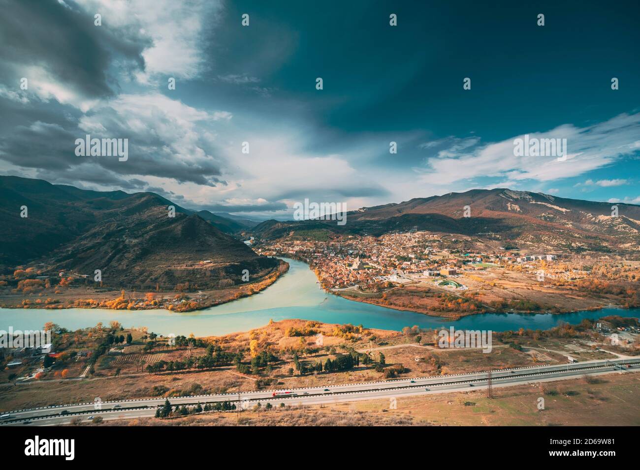 Mtskheta, Georgia. Top View Of Ancient Town Located At Valley Of Confluence Of Rivers Mtkvari Kura And Aragvi In Picturesque Highlands. Autumn Season. Stock Photo