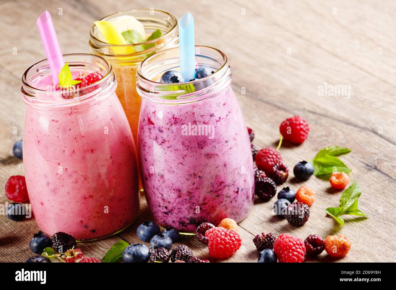 Assorted fruit shakes on white table. Smoothie concept Stock Photo Alamy