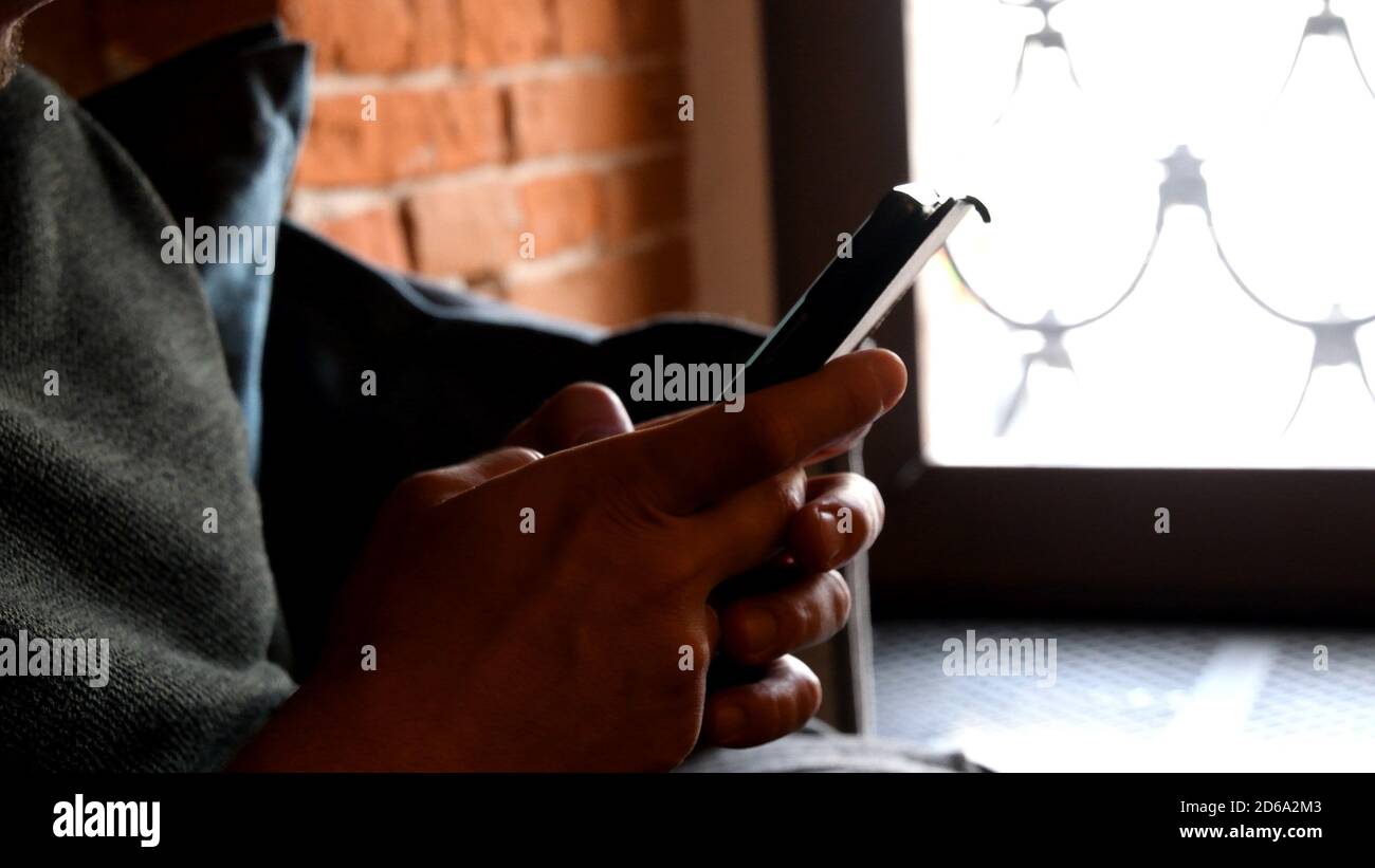 Closeup male hands scrolling typing hi-res stock photography and images ...