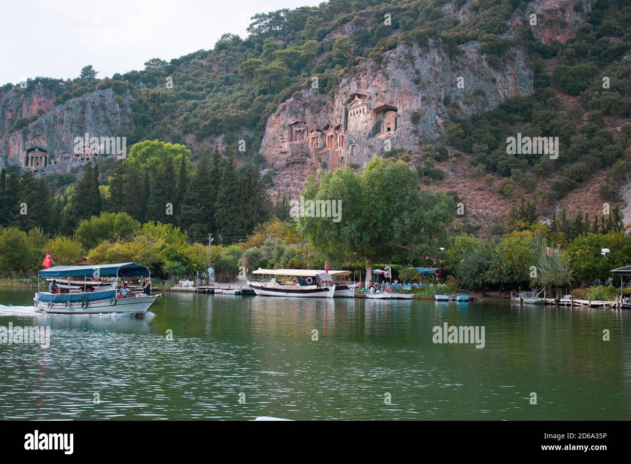 Beautiful view of Dalyan River and the ancient Lycian rock tombs, a must-see destination in Turkey Stock Photo